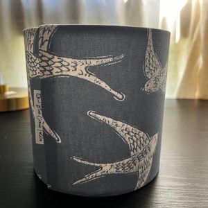 Navy lampshade with white birds. 14" h, 8" diameter